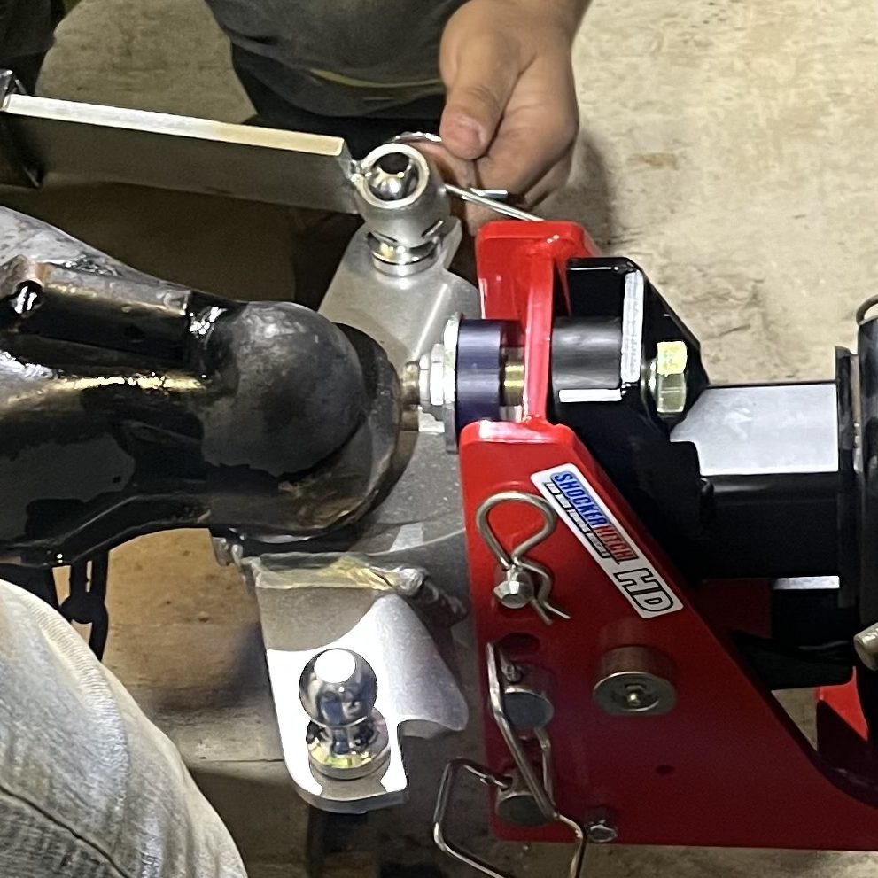 Shocker HD Air Hitch & Combo Sway with Sway Bars Being Attached