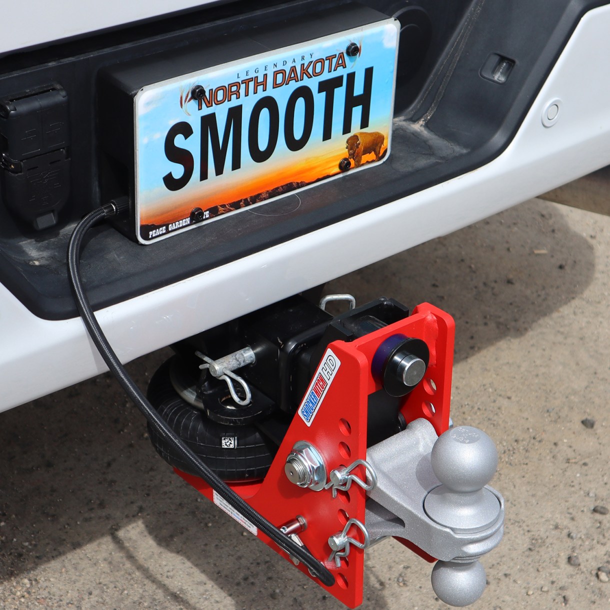 Auto Air Compressor Kit - License Plate Mount - Installed - Left Side Air Line